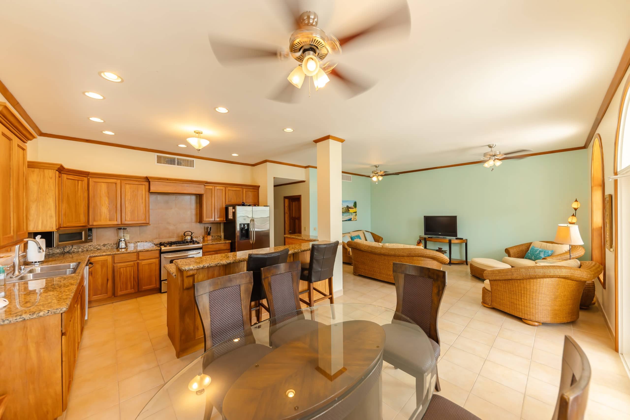 Welcoming dining area with a spacious table and seating for six, offering a perfect spot to enjoy meals with family and friends.