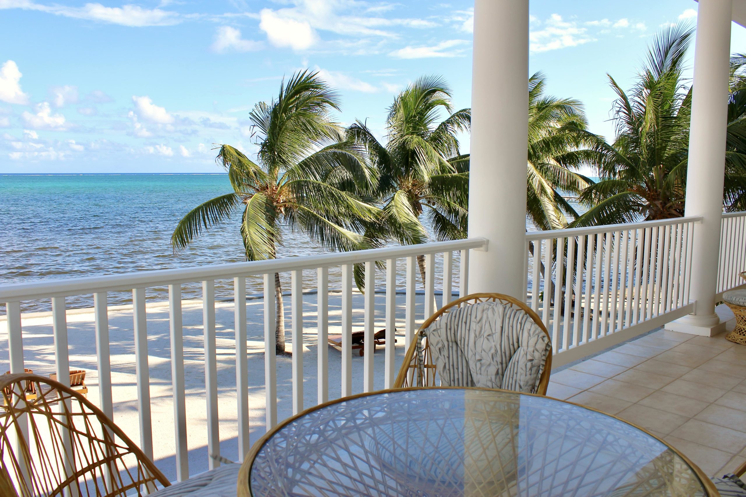 Beachfront hotel with balcony overlooking the ocean in Belize