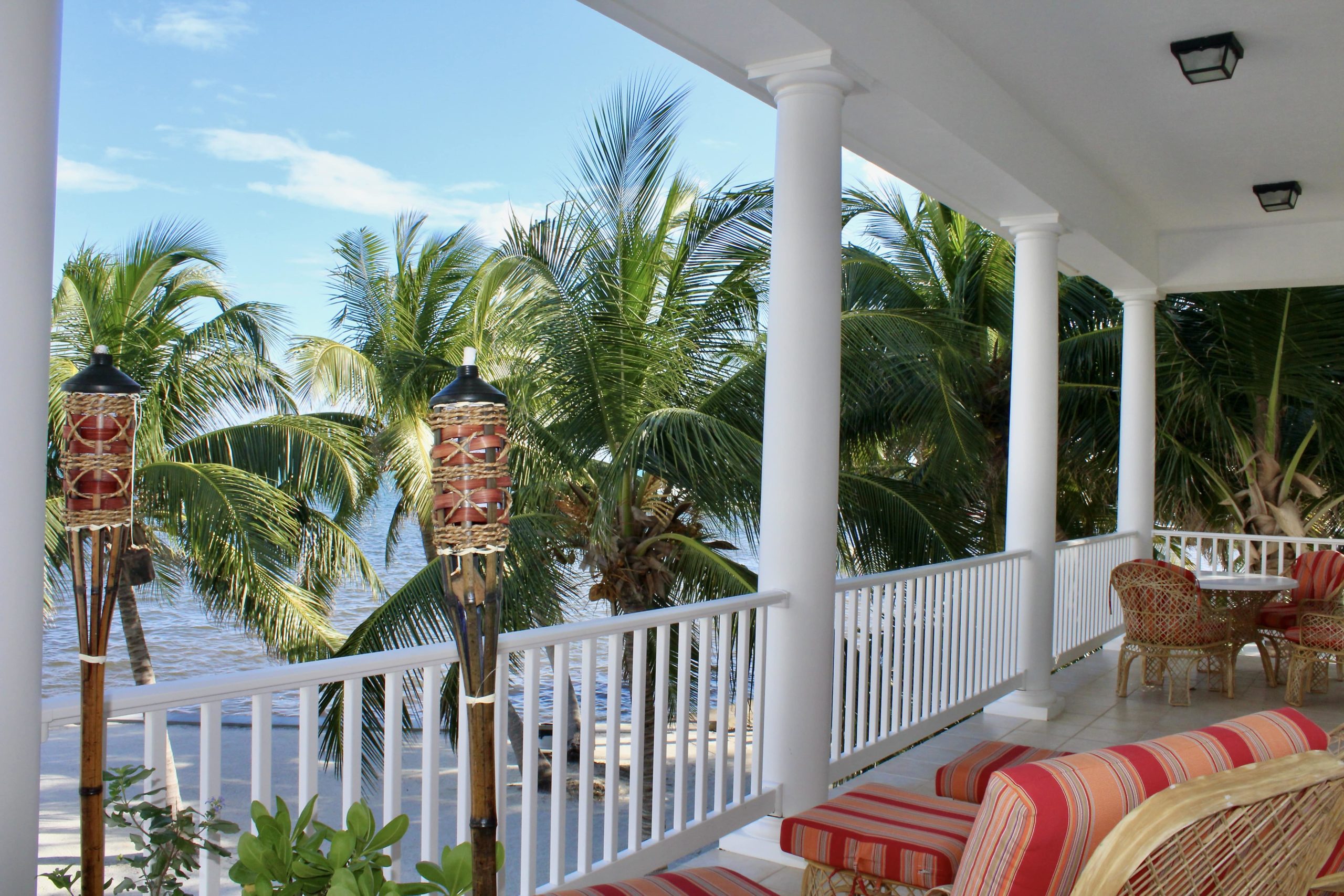 Spectacular view of the Caribbean Sea and palm trees from the second floor balcony at Tara Del Sol